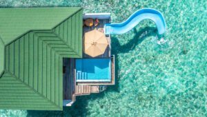 Siyam World Maldives overwater villa pool slide