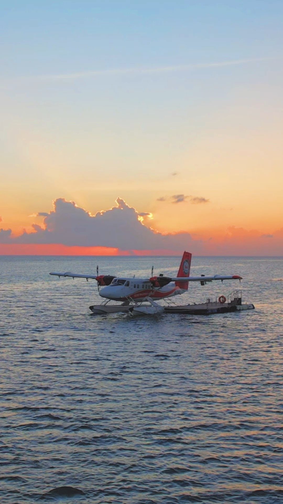 Seaplane transfer at sunset, Sun Siyam Vilu Reef, Maldives