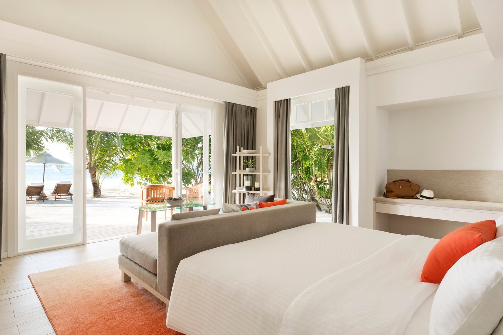 Beach Villa bedroom interior, LUX* South Ari Atoll