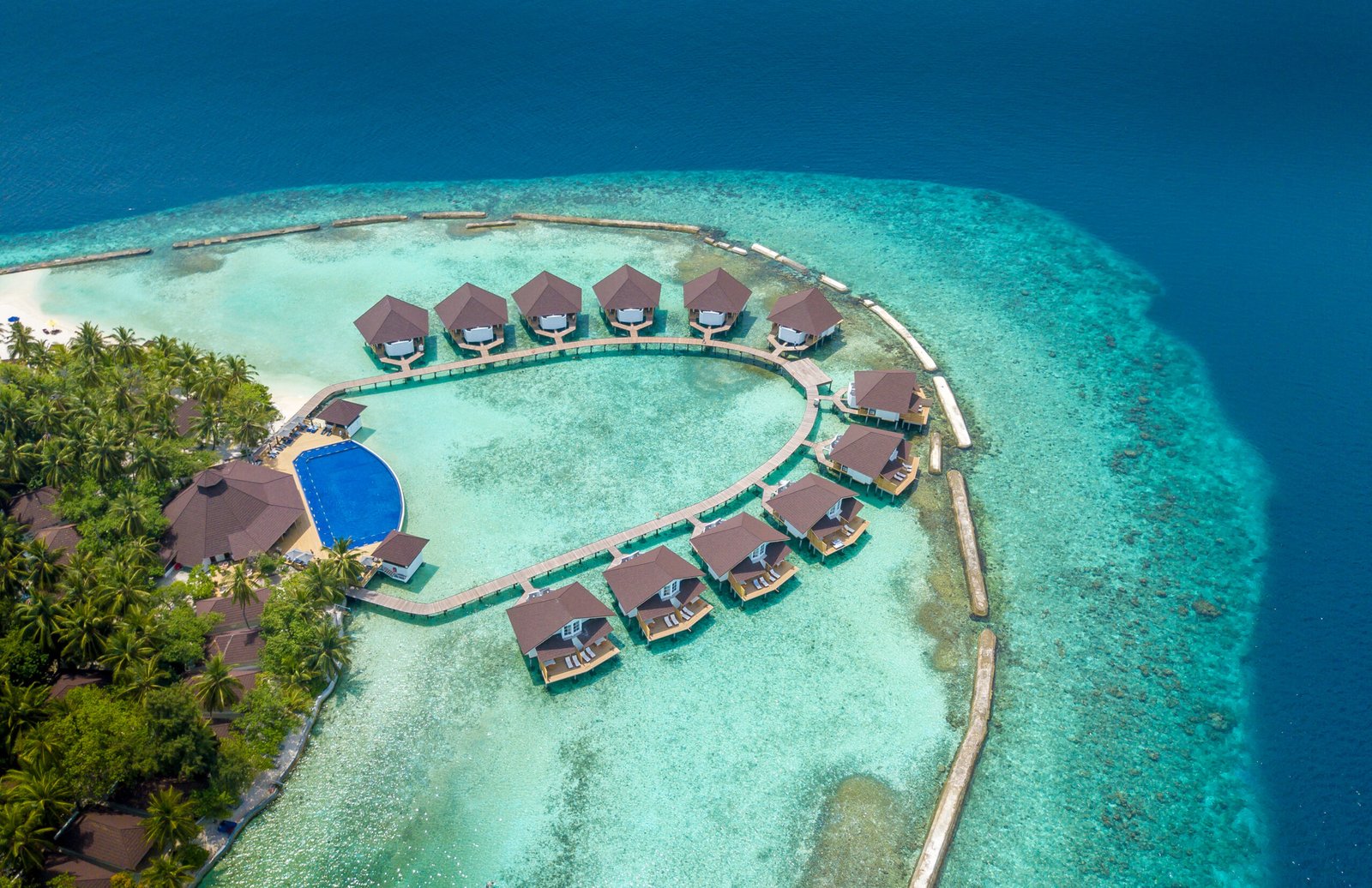 Aerial view of the lagoon and Water Bungalows, Ellaidhoo Maldives by Cinnamon