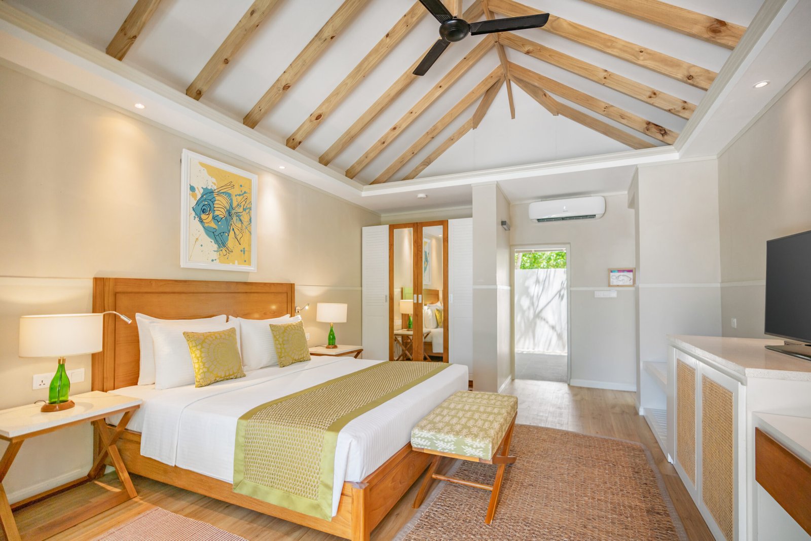 Beach Bungalow bedroom interior, Ellaidhoo Maldives by Cinnamon