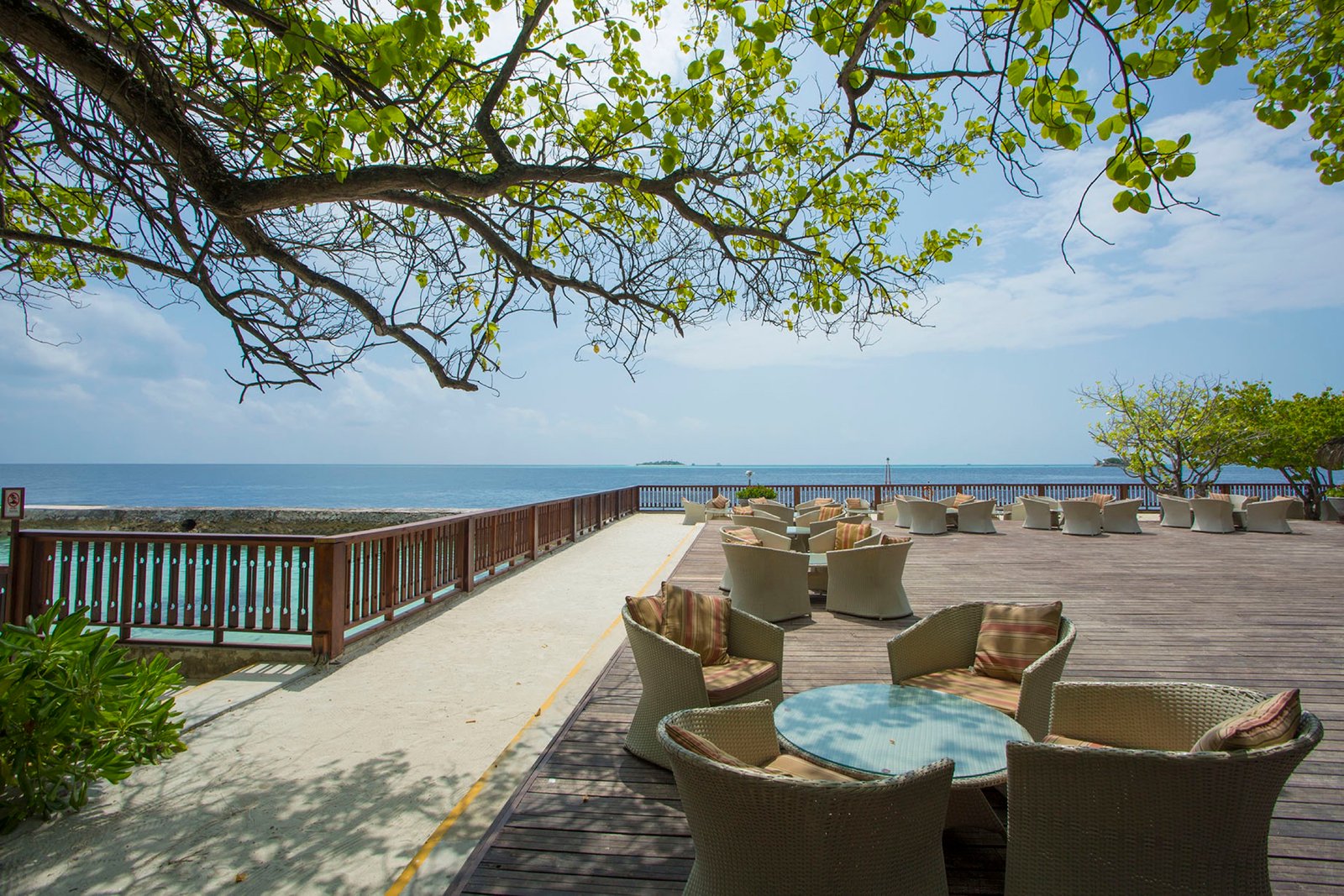 Iruohsenee bar deck over the water, Ellaidhoo Maldives by Cinnamon