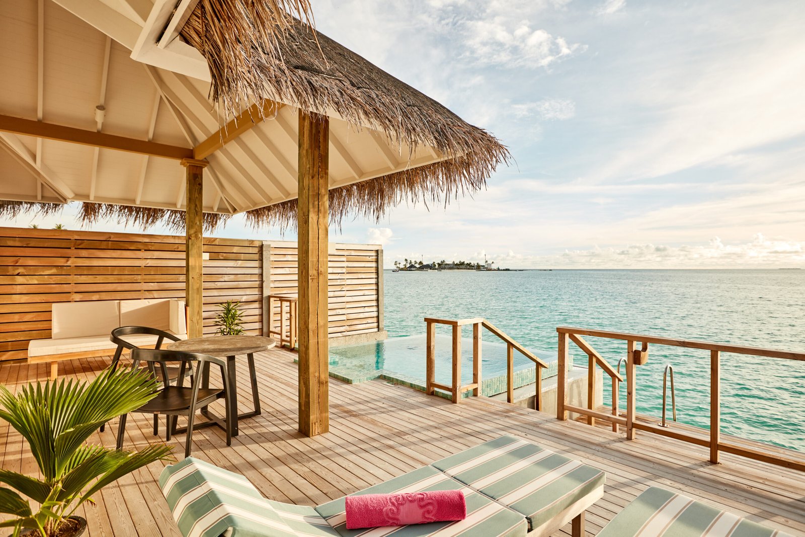 Overwater villa deck and plunge pool over the lagoon, Sun Siyam Iru Veli, Maldives