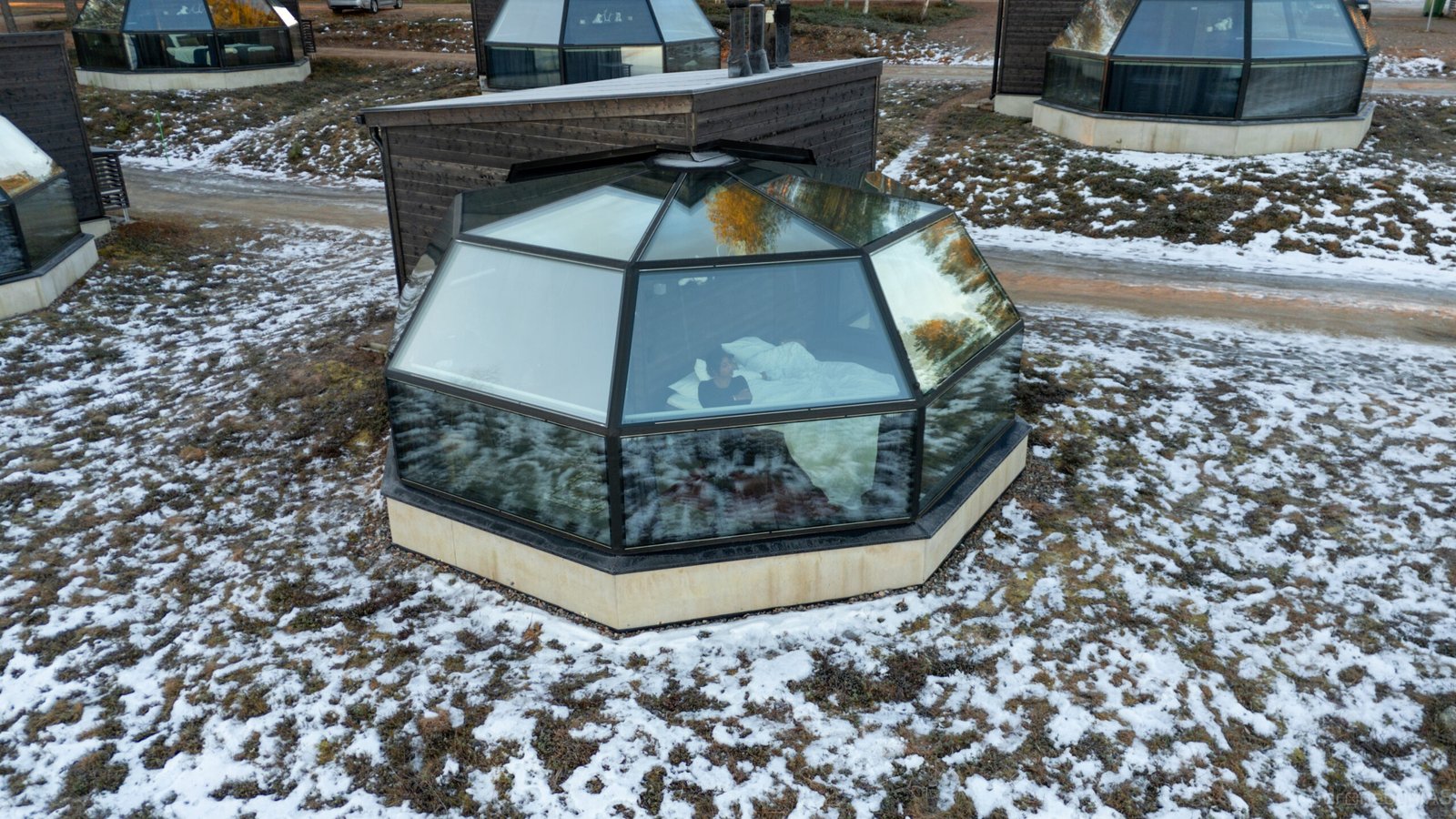 Aerial drone view of a Glass Igloo, Ranua Resort, Finnish Lapland
