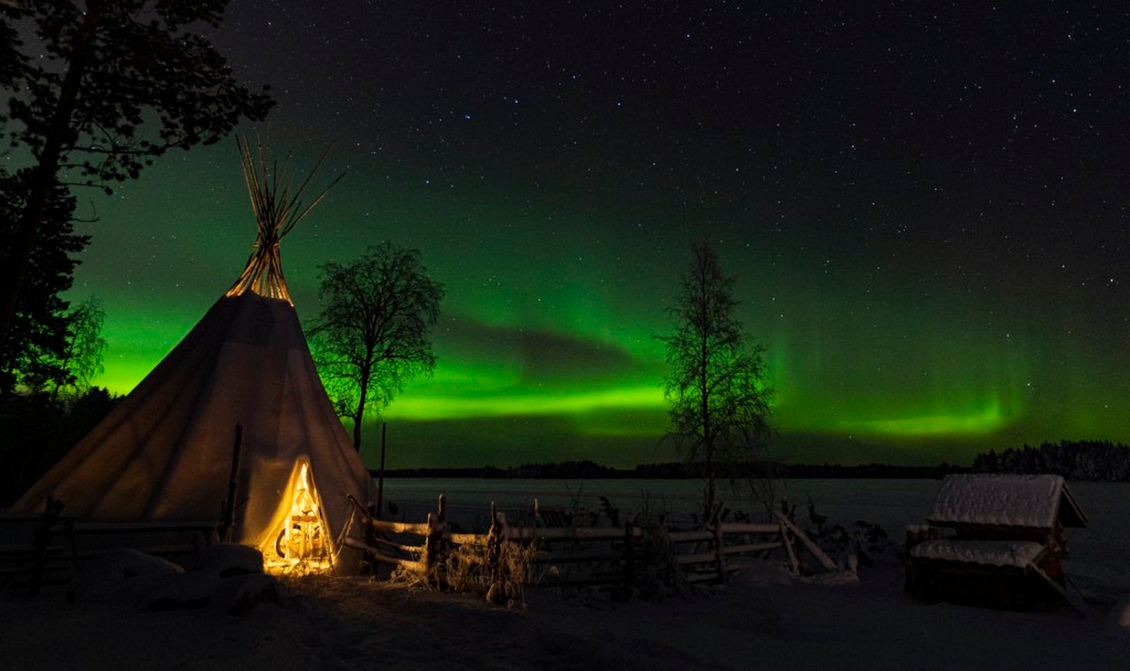 Lappish hut under the northern lights, Ranua
