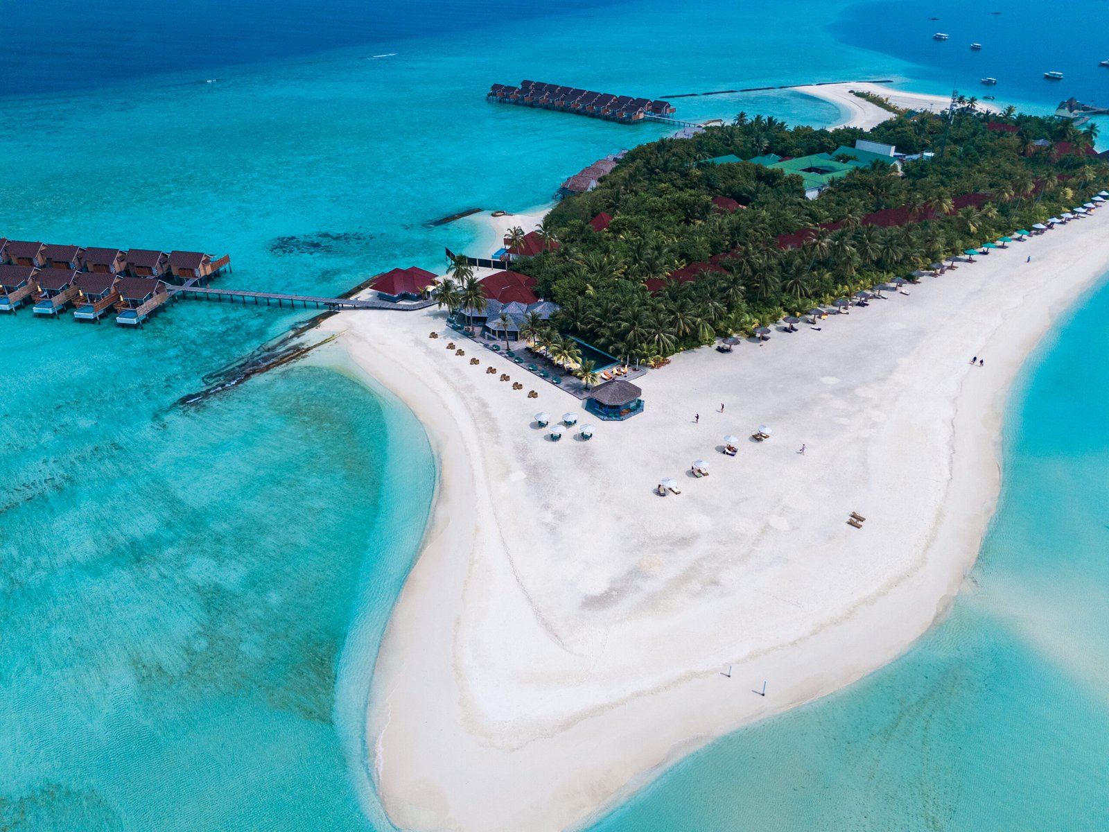 Lagoon and overwater walkway at Dhigufaru Island Resort, Baa Atoll