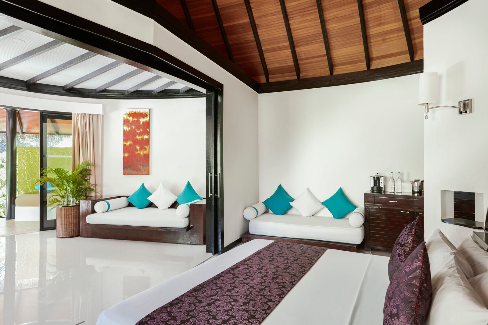 Pool Beach Villa bedroom and living area interior, Sun Siyam Iru Fushi