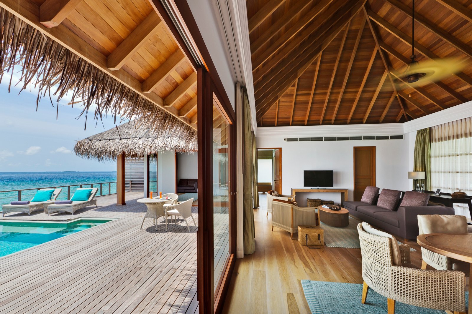 Two Bedrooms Overwater Pool Villa living area and deck, Dusit Thani Maldives