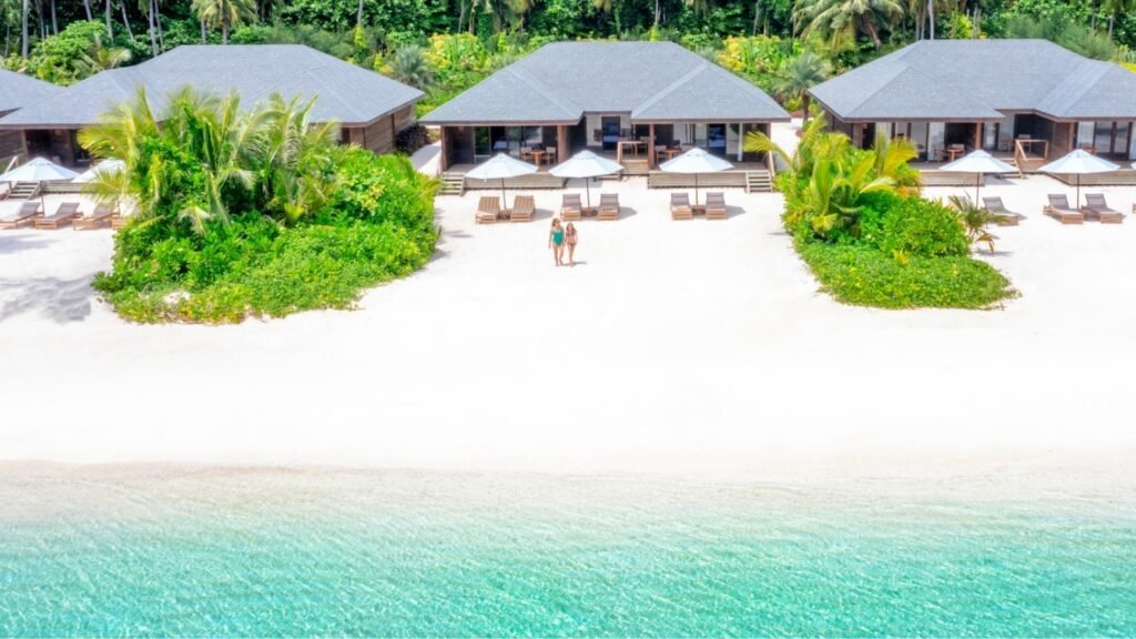 Aerial view of overwater villas, Jawakara Islands Maldives