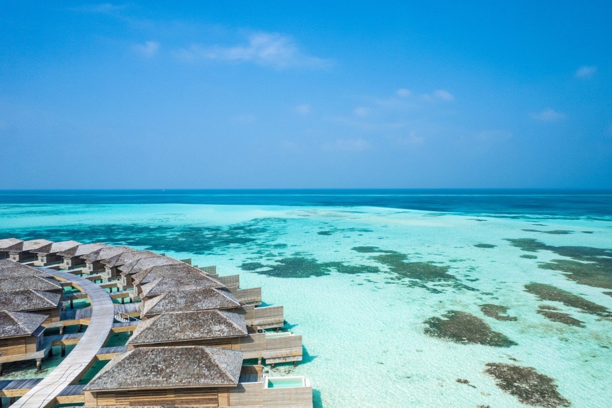 Overwater dining venue interior, Jawakara Islands Maldives