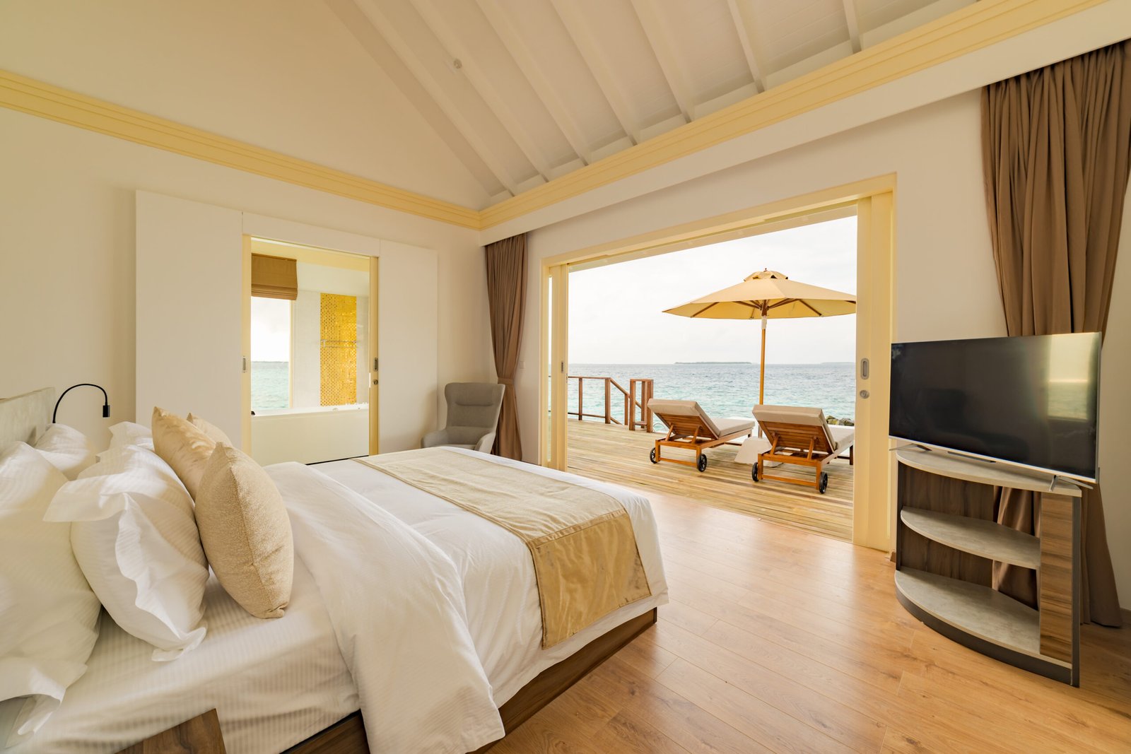 Water Pavilion bedroom interior with ocean view, Siyam World