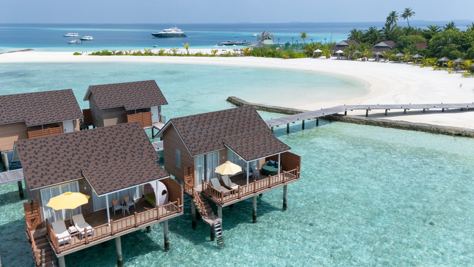 Water Villa exterior over the lagoon, Dhigufaru Island Resort, Baa Atoll