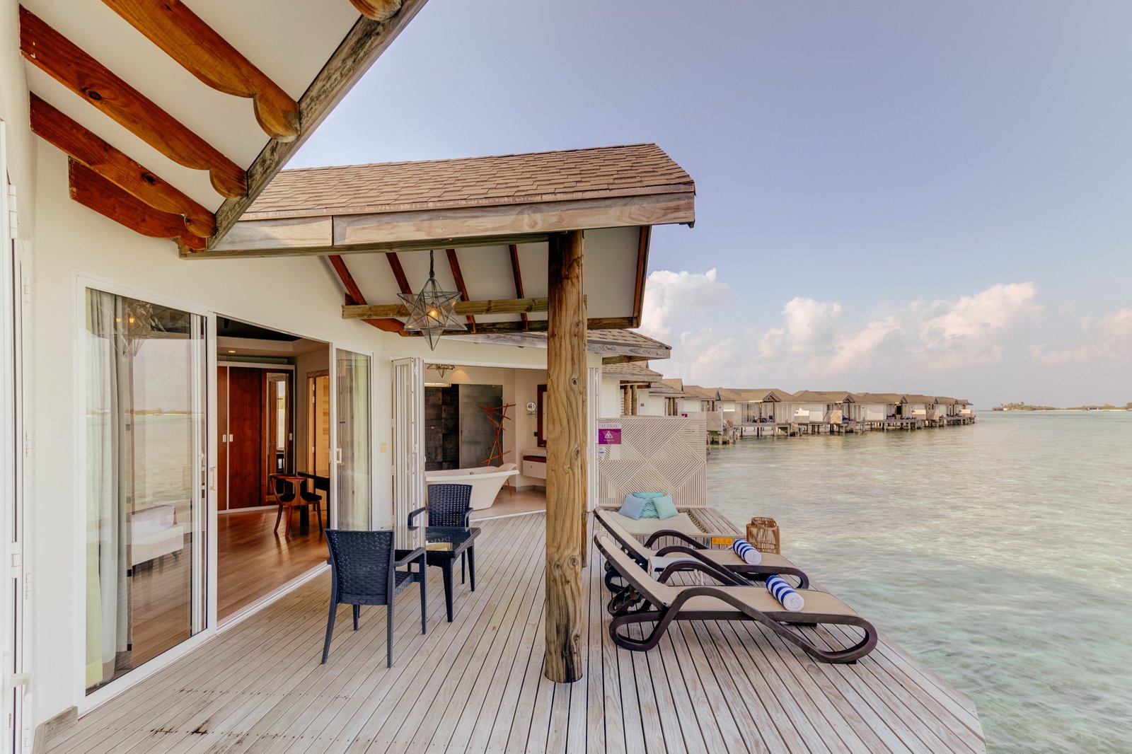 Over Water Suite deck over the lagoon, Cinnamon Dhonveli Maldives