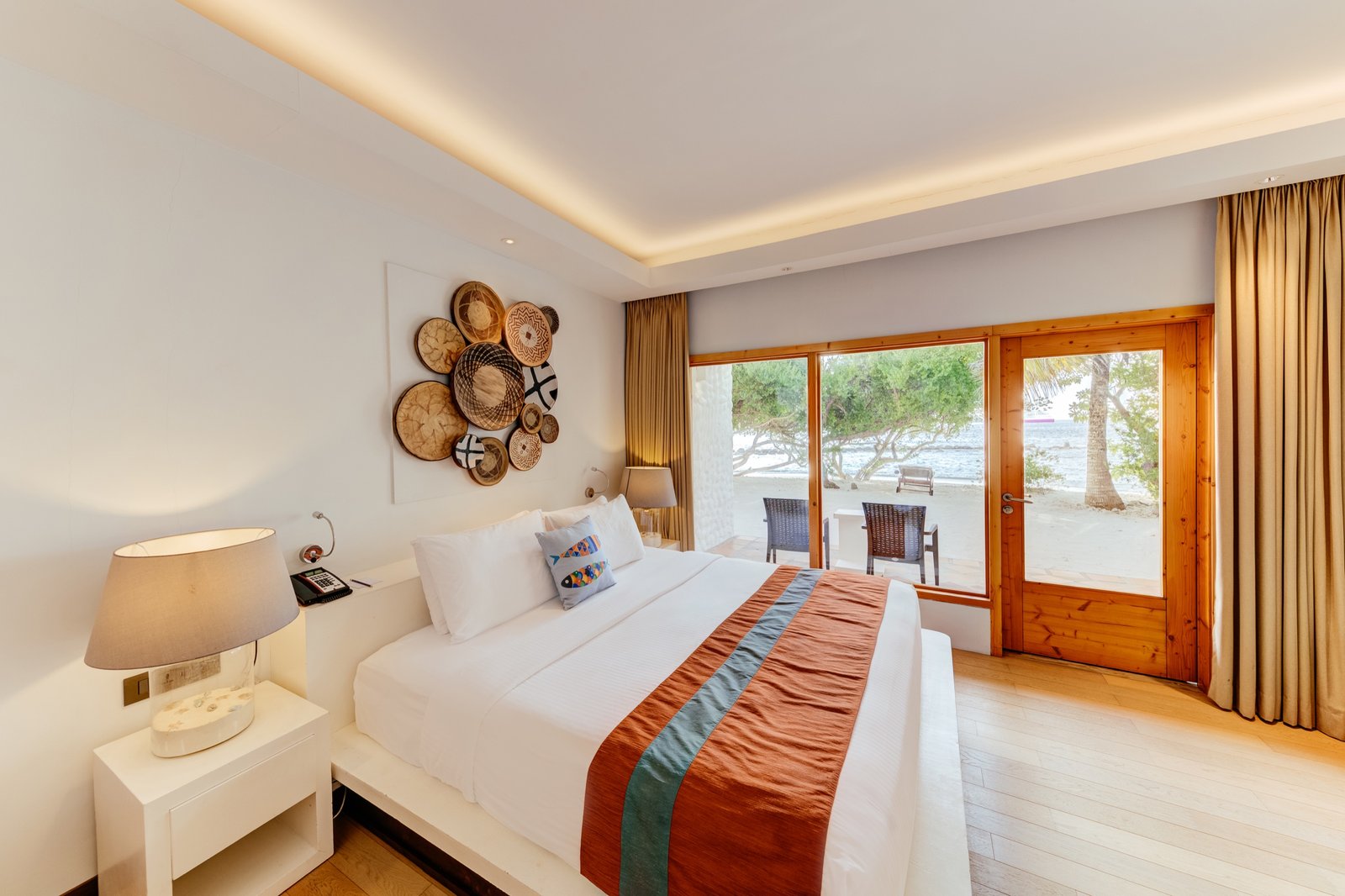 Superior Room Ocean View bedroom opening to the terrace, Cinnamon Dhonveli Maldives