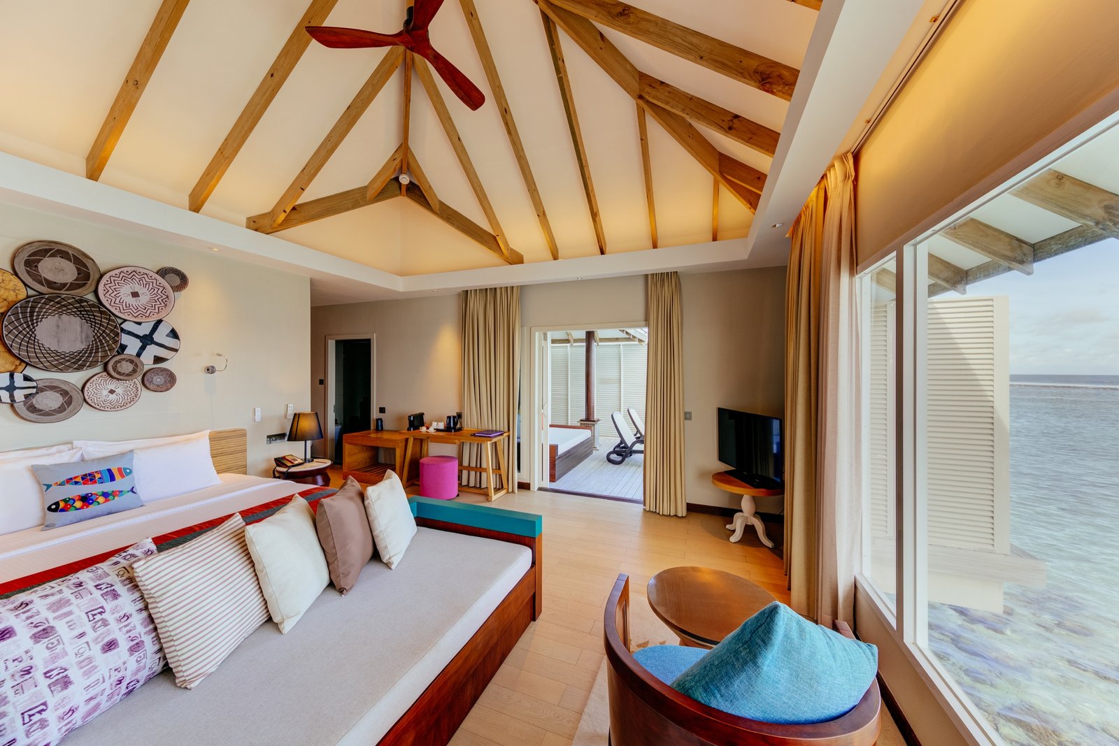 Water Bungalow bedroom with lagoon view, Cinnamon Dhonveli Maldives