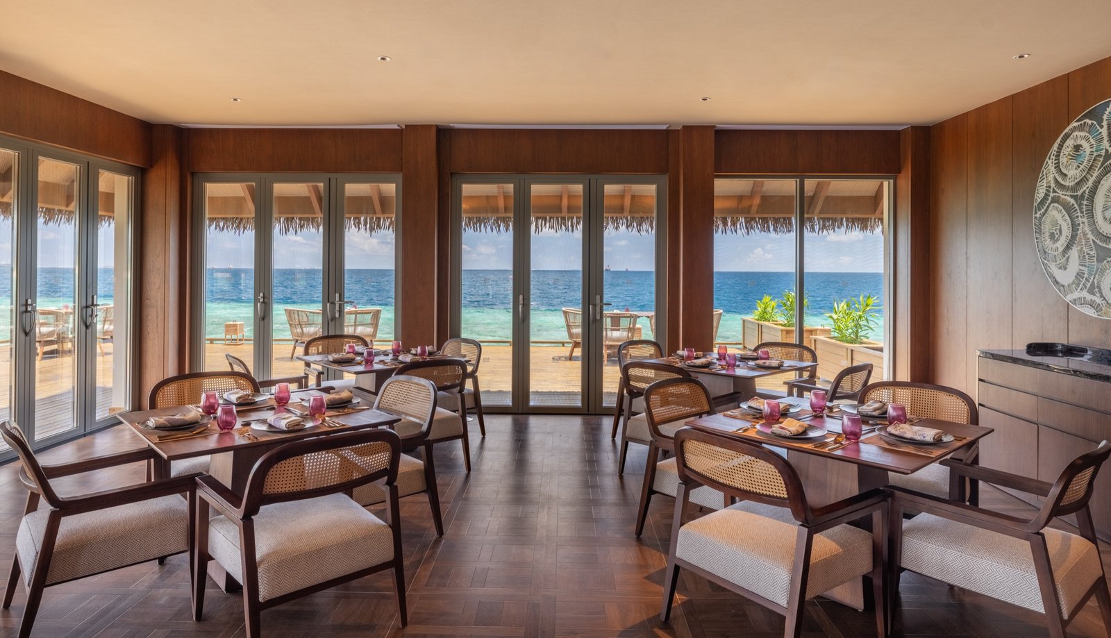 bō Asian restaurant interior looking out over the water, dusitD2 Feydhoo Maldives