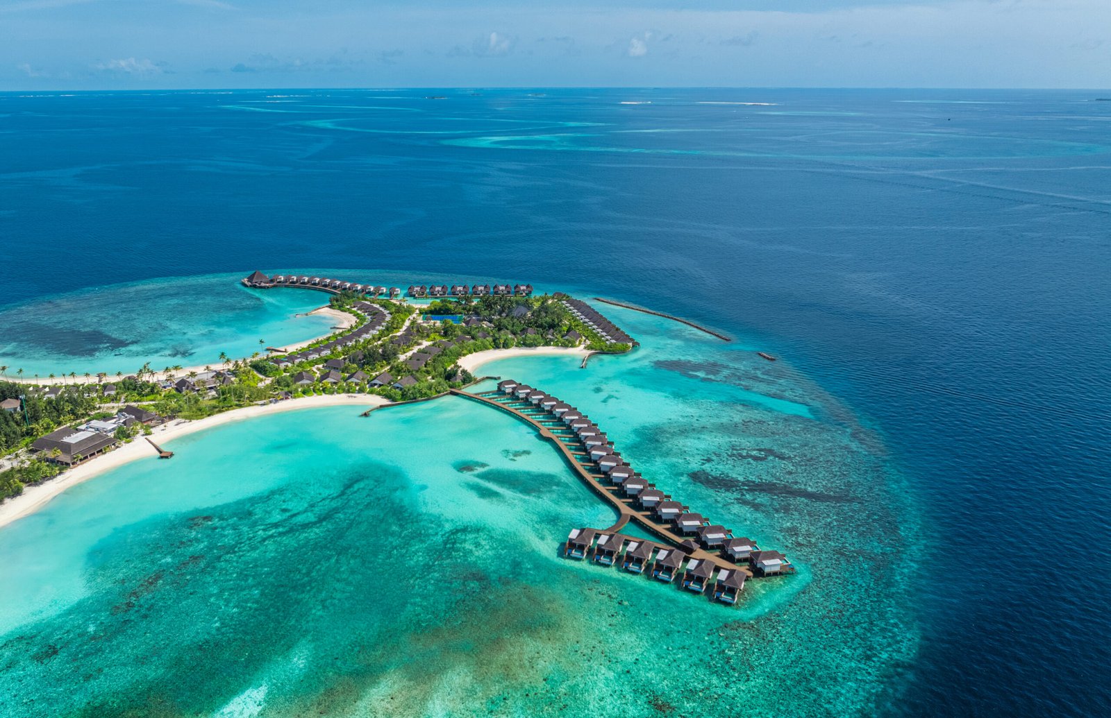 Aerial view of white-sand beaches and lagoon at dusitD2 Feydhoo Maldives, Maldives