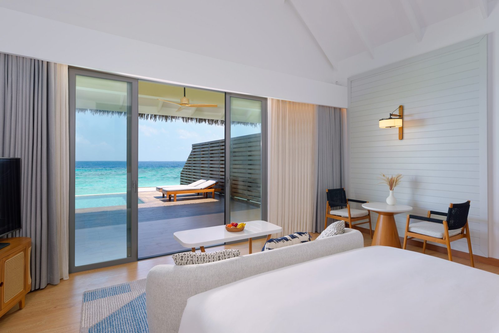 dusitd2-feydhoo-maldives-accommodation-waterfront-pool-villa-bedroom-pool-scaled