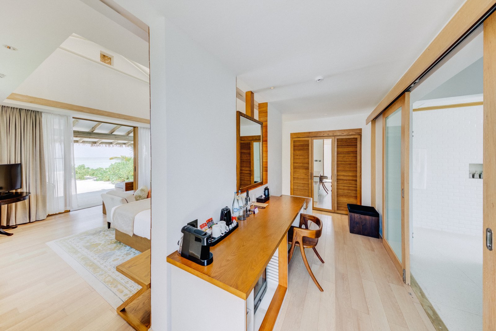 Platinum Beach Bungalow interior looking out to the beach, Cinnamon Hakuraa Huraa Maldives