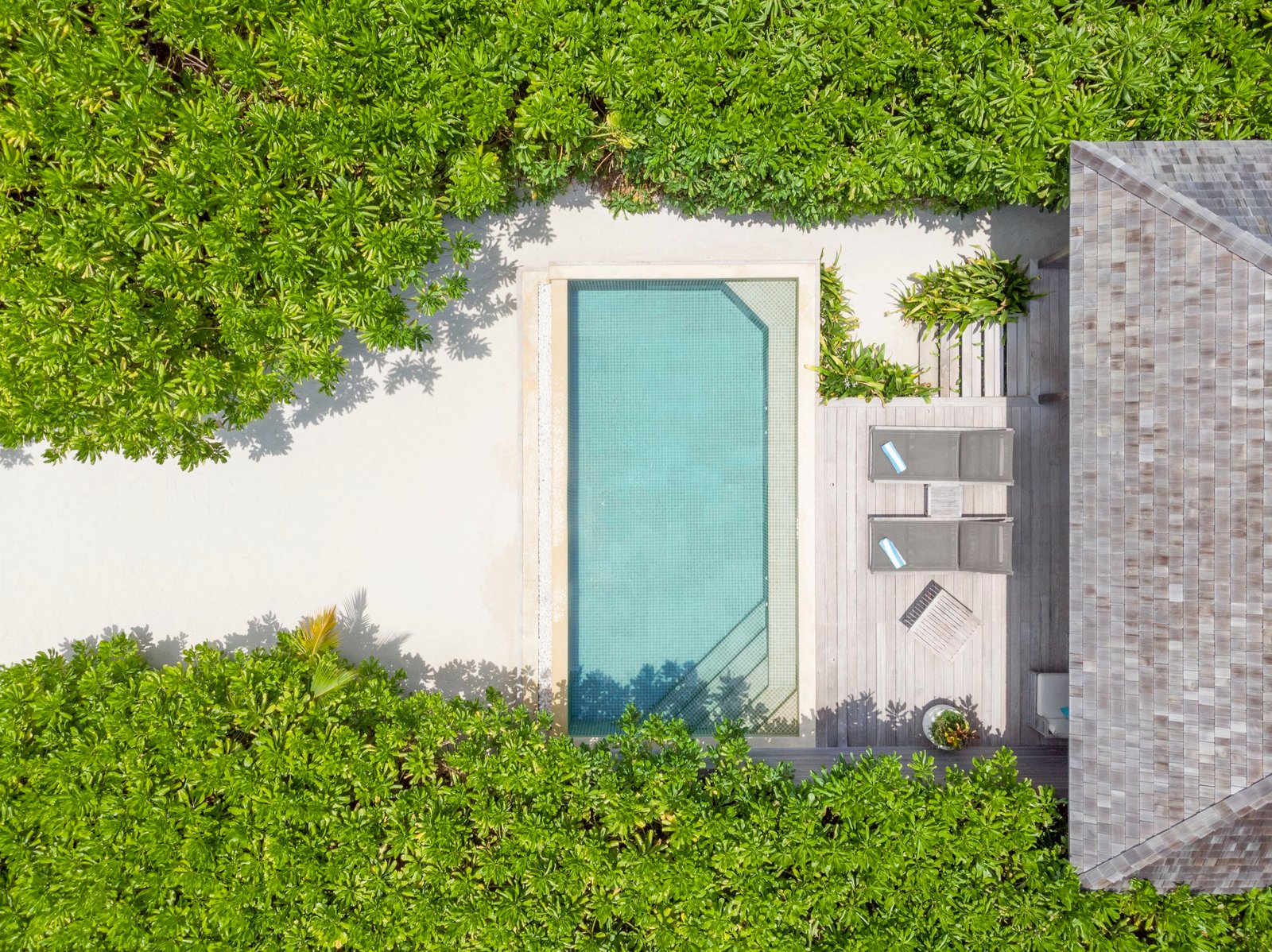 Beach Pool Villa private pool and deck from above, Hurawalhi Island Resort — the Beach Sunset Pool Villa shares this same 132 m² beachfront design on the sunset-facing side