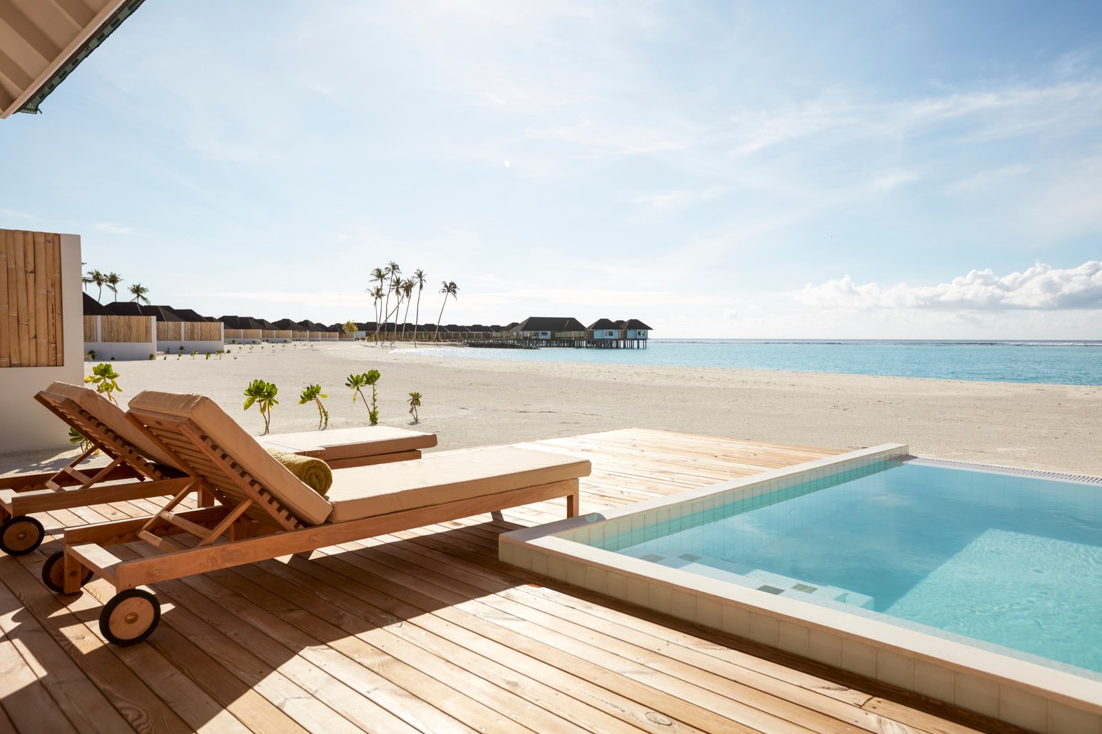 Private pool and beachfront deck of a Grand Beach Villa with Pool, Sun Siyam Olhuveli