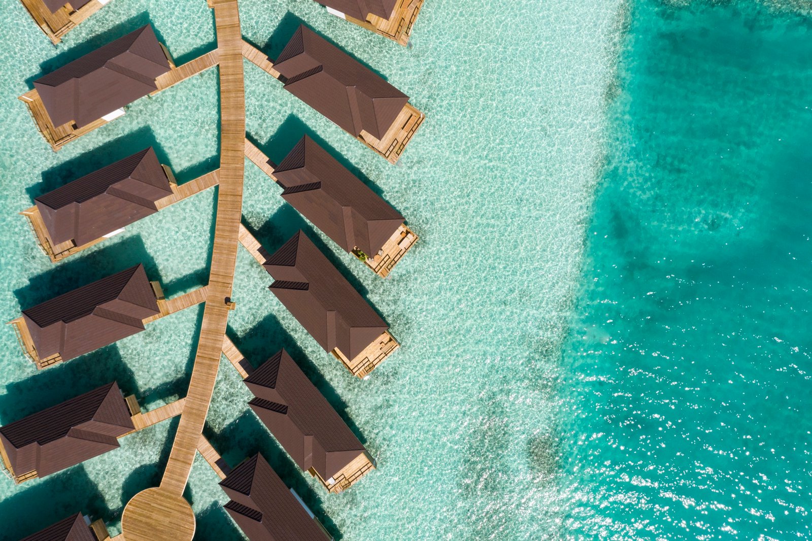 Aerial view over the Grand Water Villa jetty, Sun Siyam Olhuveli