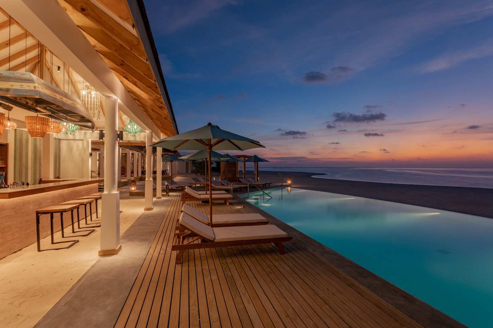The adults-only island pool at dusk, Cinnamon Hakuraa Huraa, Meemu Atoll