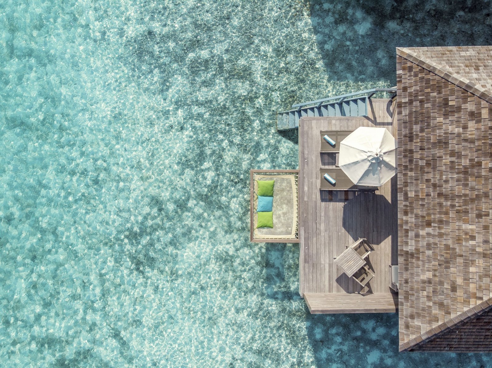A Romantic Ocean Villa and its deck over the lagoon, Hurawalhi Island Resort, Lhaviyani Atoll