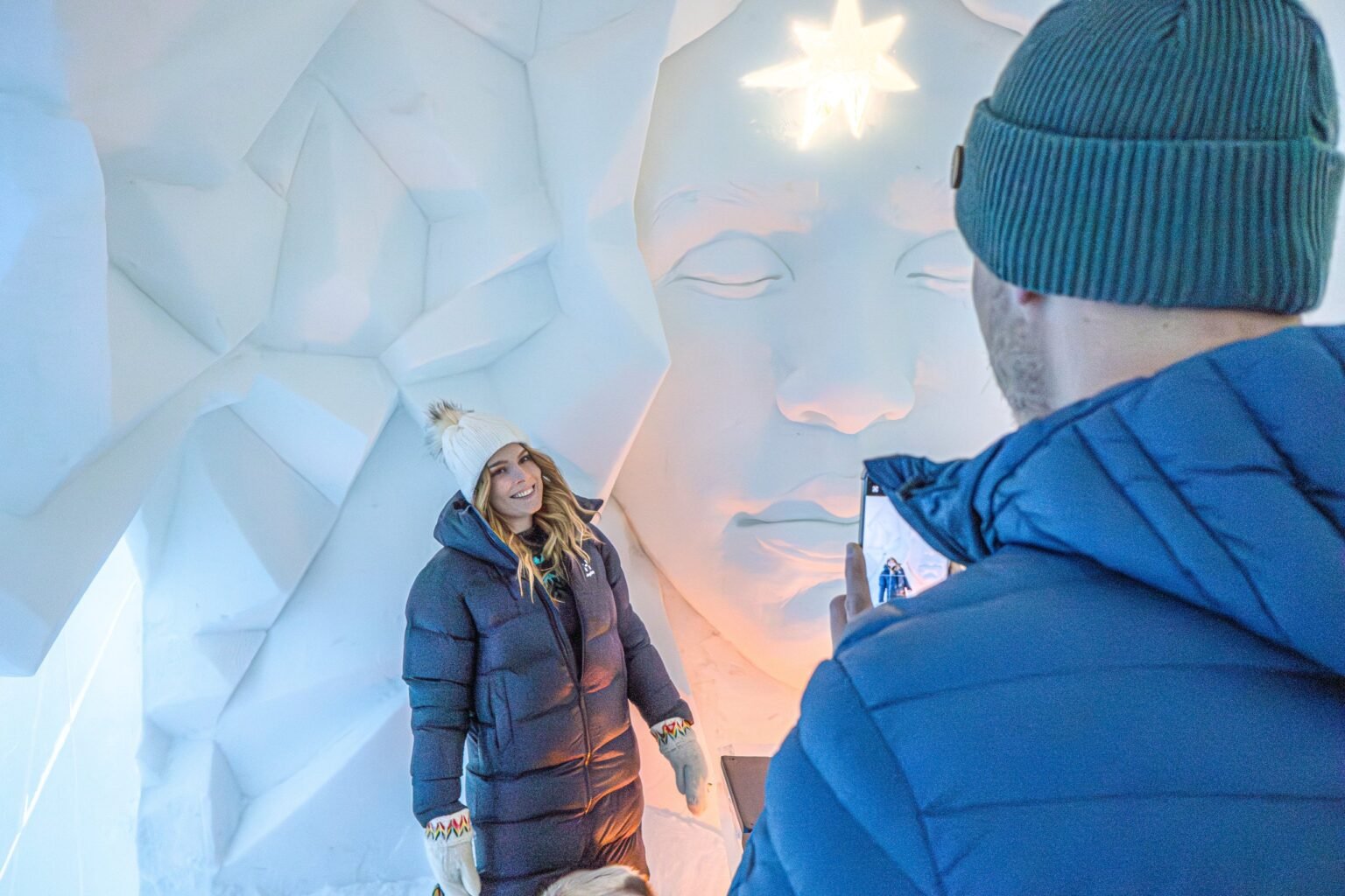 Visitors inside the snow hotel — Arctic SnowHotel & Glass Igloos, Sinettä, Rovaniemi