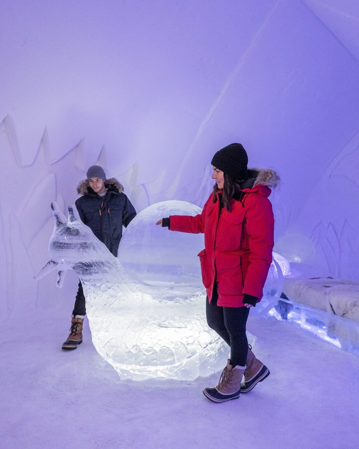 Visitors inside the snow hotel — Arctic SnowHotel & Glass Igloos, Sinettä, Rovaniemi