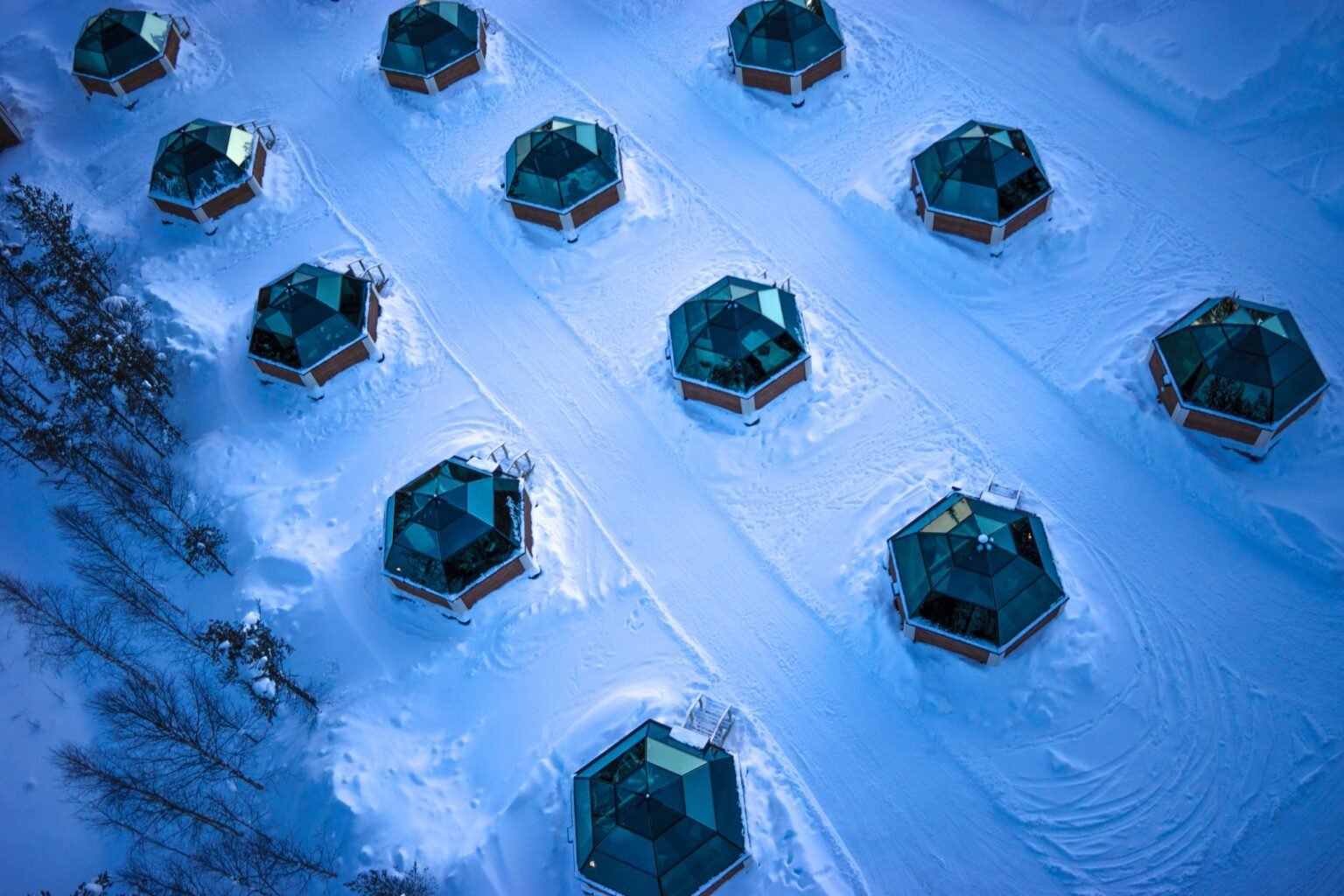 A heated glass igloo under the night sky — Arctic SnowHotel & Glass Igloos, Sinettä, Rovaniemi