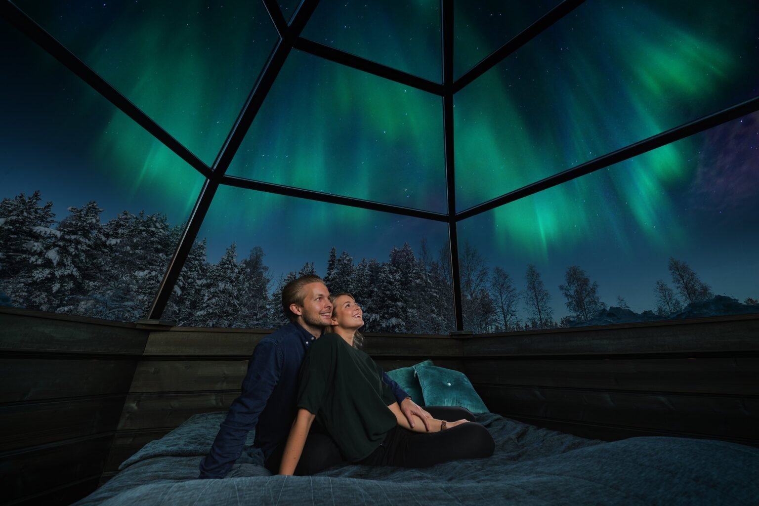 A heated glass igloo under the night sky — Arctic SnowHotel & Glass Igloos, Sinettä, Rovaniemi