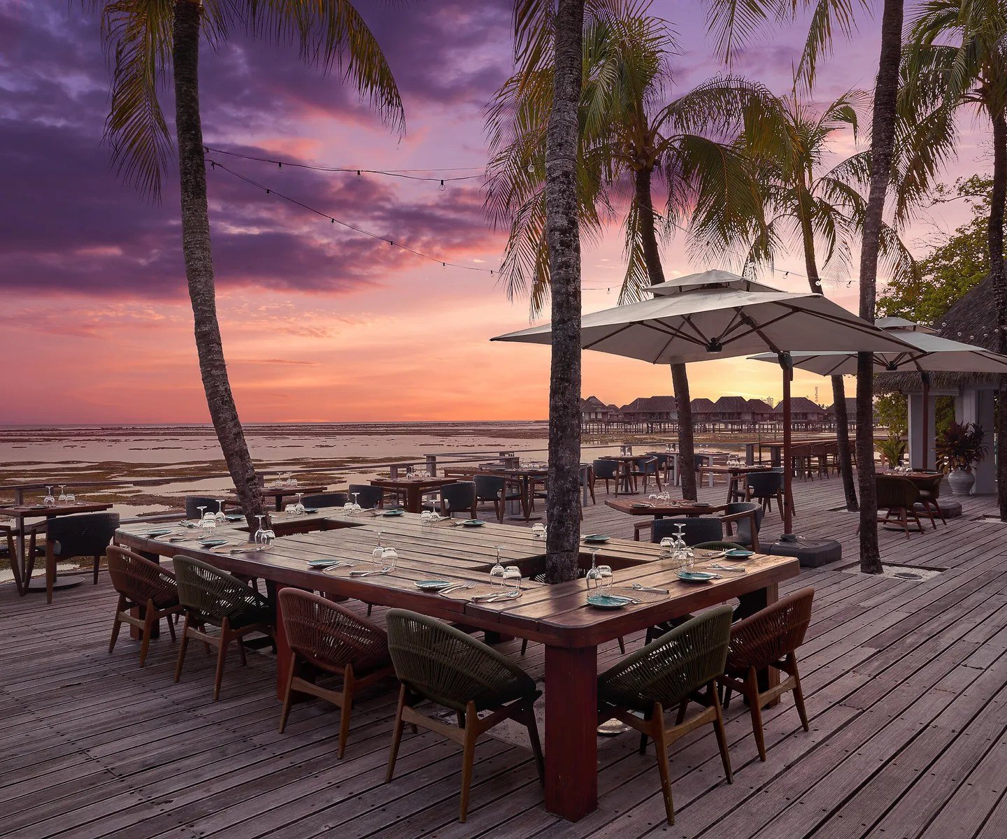 Dining on the deck at sunset, Club Med Kani, the Maldives