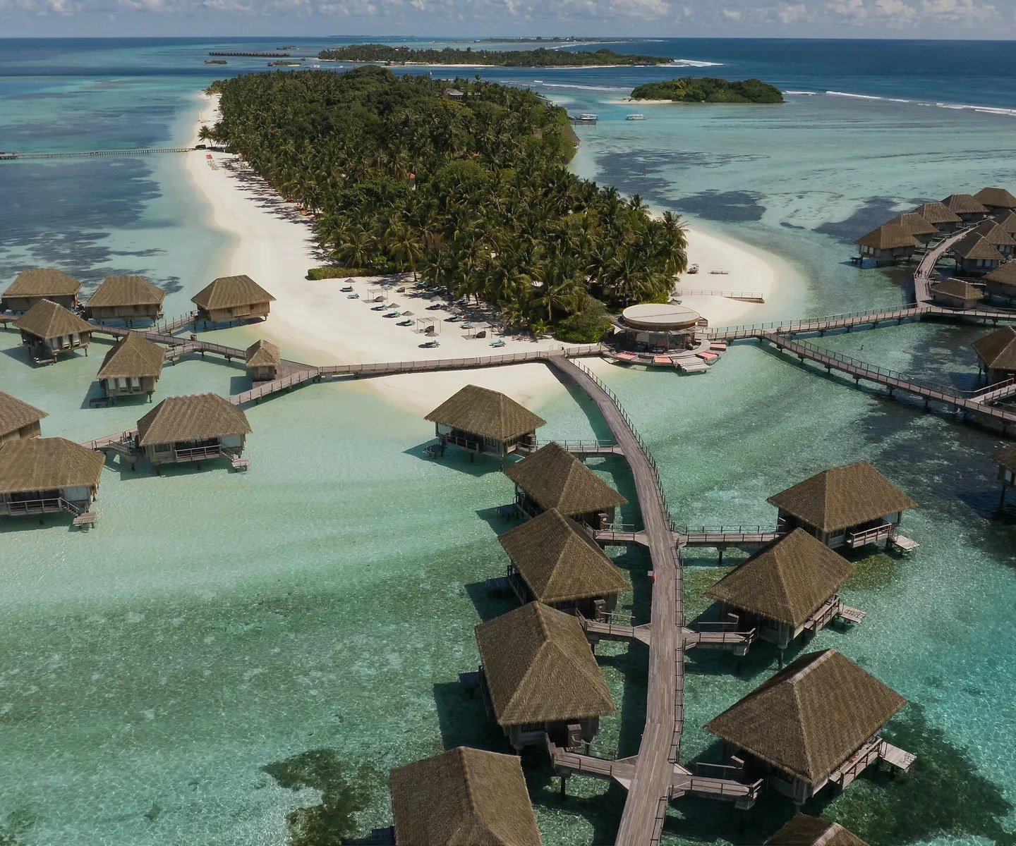 Aerial view of the island and its overwater suites, Club Med Kani, the Maldives