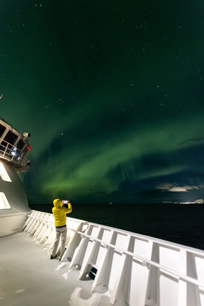 The northern lights over the sea on the Norwegian coastal route