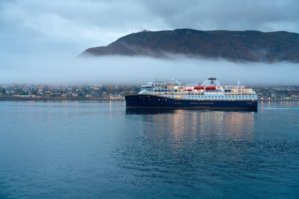 Havila Pollux crossing Tromsø sound in low cloud