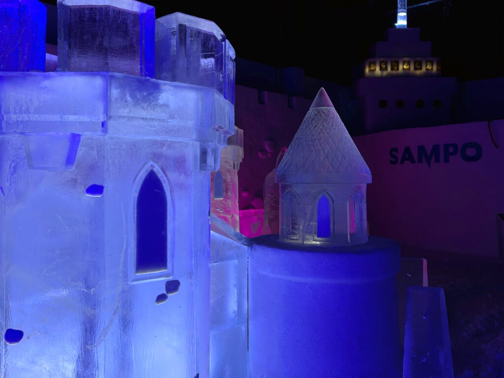The ice restaurant inside the Snow Castle at Kemi, an ice table set with reindeer-hide seats — view 2