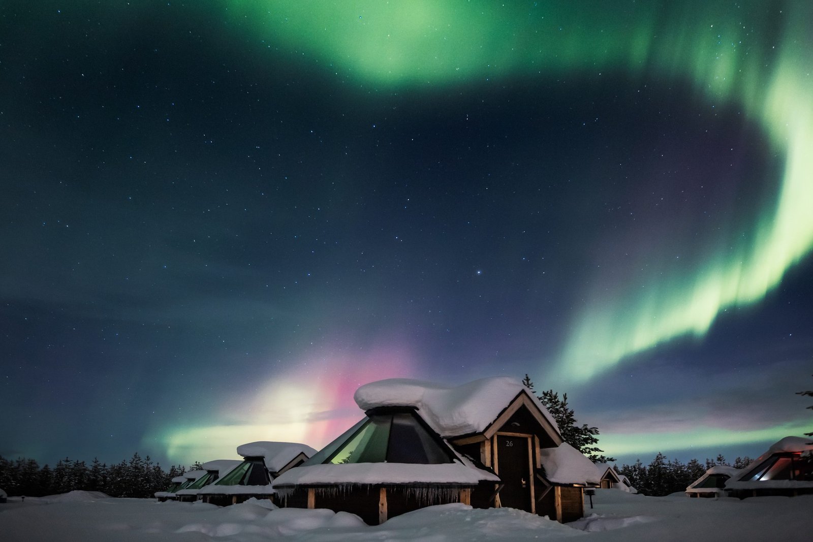 An Aurora Cabin beneath the northern lights, Northern Lights Village Levi