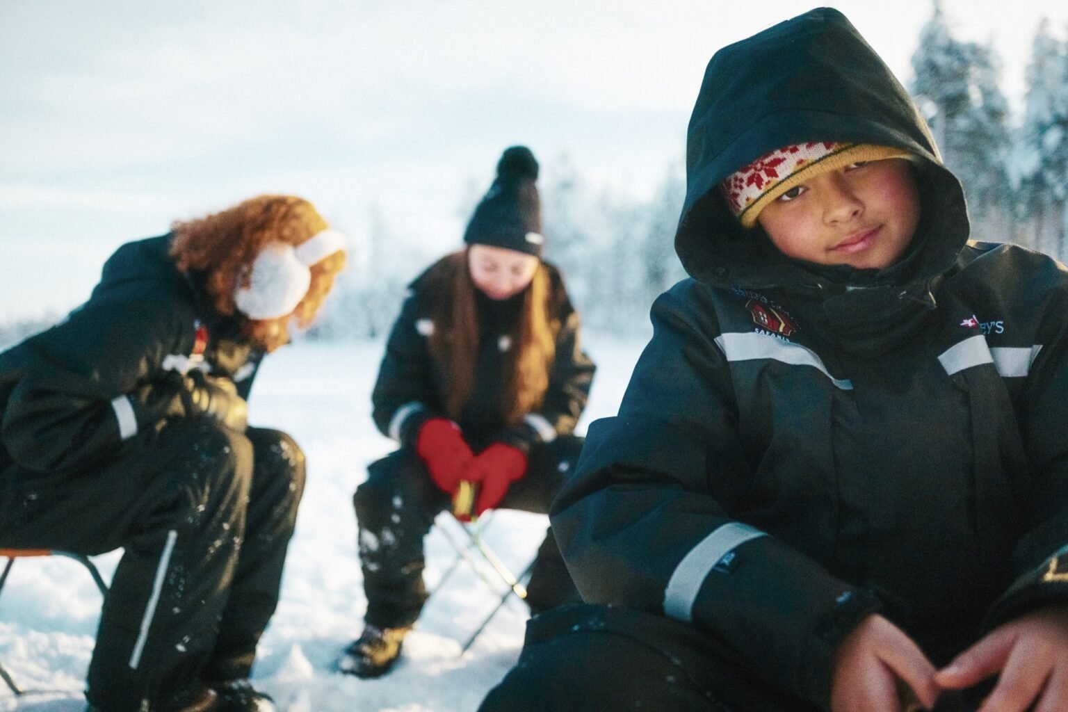 Snowmobiling & ice fishing at Santa Claus Holiday Village