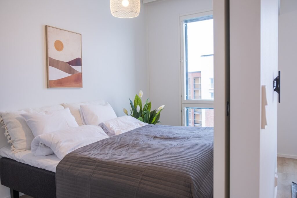 The sleeping area of a studio apartment in central Rovaniemi